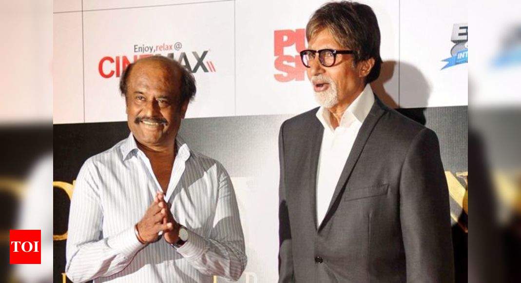 Rajinikanth falls at Amitabh s feet Tamil Movie News Times of India