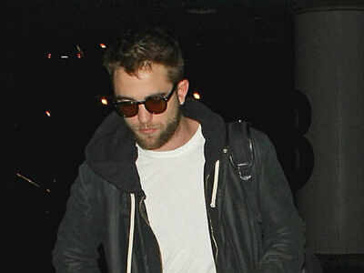 Robert Pattinson avoids Liberty Ross