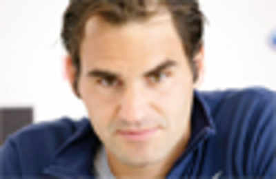 Federer won't change schedule as his family grows