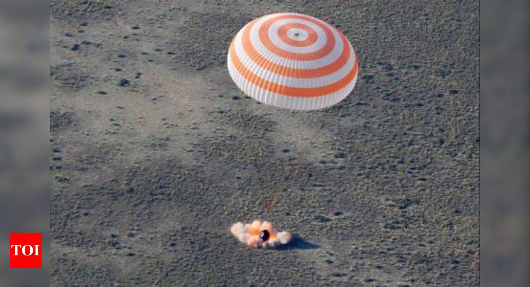 Three astronauts return to Earth Times of India