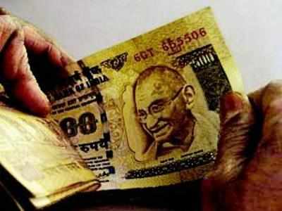 Rupee up 7 paise against dollar in early trade