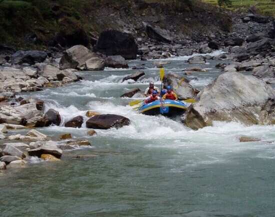 Paddling along the Sun Kosi