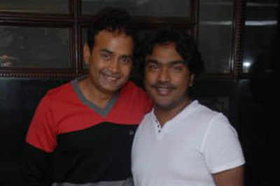 Sharan and Arjun Janya bond at Adhyaksha press meet in Bangalore