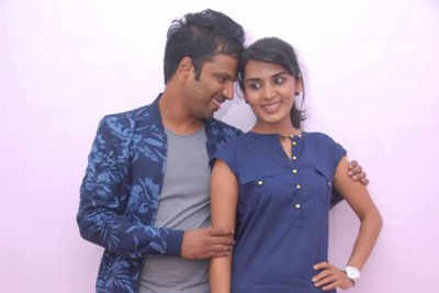 Sathish Neenasam and Sindhu Loknath at Love In Mandya audio release in Bangalore