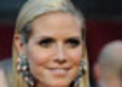 Heidi, Aniston's bad 'hair-day' at Oscars