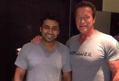 Suriya gets Arnold's book from the Terminator himself