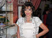 
Joan Collins donates designer clothes to charity
