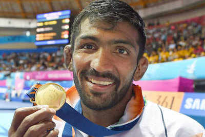 Yogeshwar Dutt's wrestling gold lifts India in medal tally