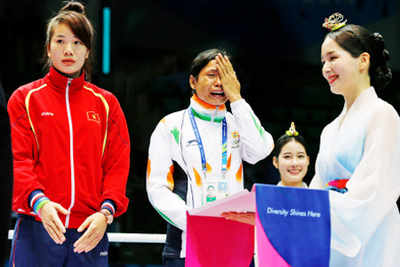 Inconsolable Sarita refuses bronze, medal with organisers