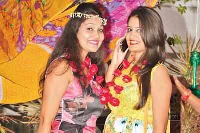 Students chill out at a Hawaiian pool party organised by a hotel in Lucknow