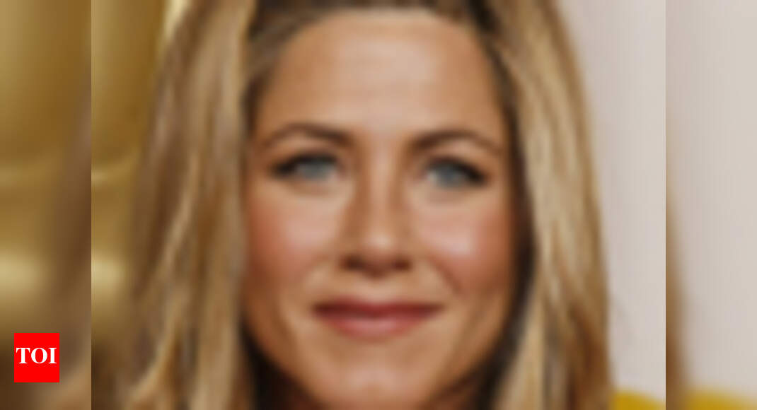 Cooper denies romance with Aniston English Movie News Times of India