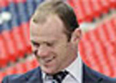 Rooney looks for baldie cure
