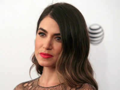 Nikki Reed goes skiing with Ian Somerhalder, brother