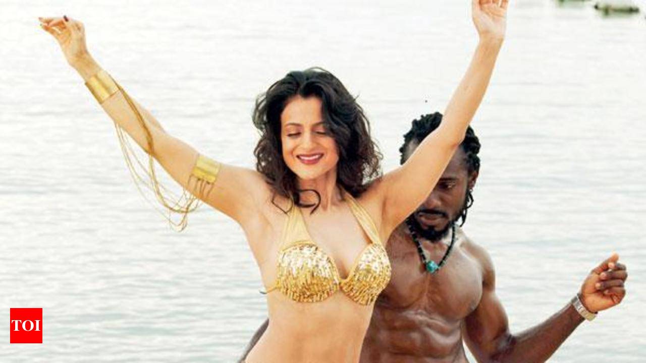 Ameesha Patel kicked about playing a double role in her maiden production |  Hindi Movie News - Times of India