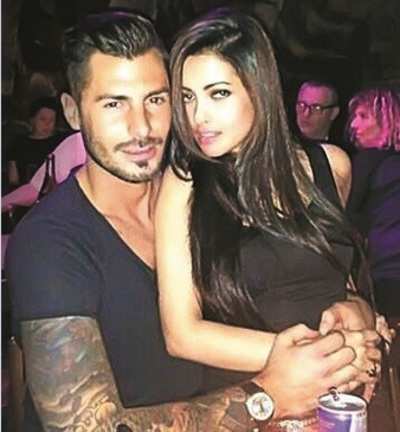 Who is that David Beckham look-alike with Riya Sen?