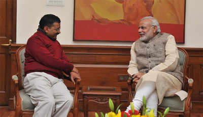Arvind Kejriwal meets PM Narendra Modi, invites him for swearing-in ceremony