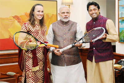Paes-Hingis present Australian Open winning racquets to PM Modi
