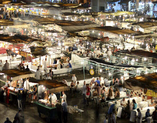 Explore the souks at Jemaa El Fna