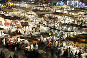 Explore the souks at Jemaa El Fna