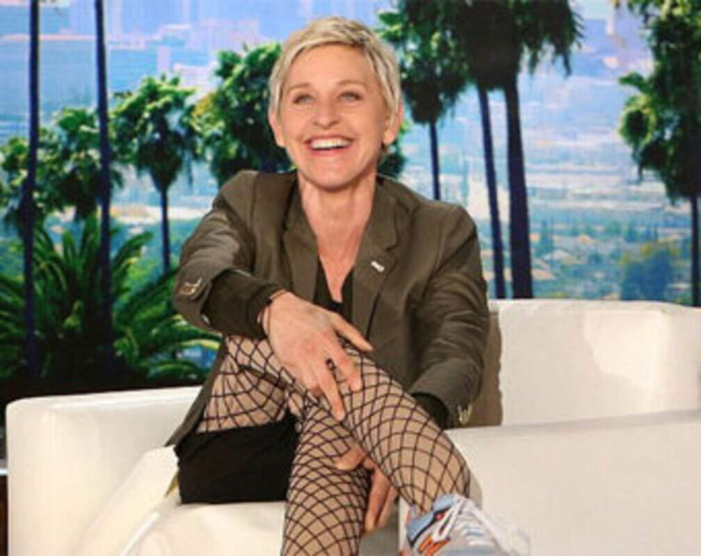 Ellen wears fishnet stockings for 