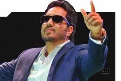 Mika Singh slaps a fan during a conference?