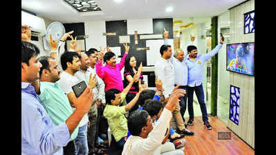 Employees enjoy India Vs Australia match in offices in Noida