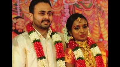 Sreekutty Asokan - Sanoop Sanil at their wedding in Kochi