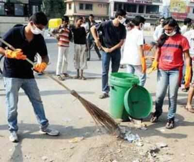 Youngsters get their hands dirty, clean up flyover at Pallavaram