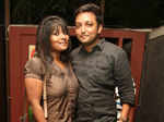 Rachel and Vijay during a party