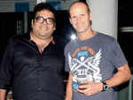 Amit Arora and Gary Kirsten pose during an after party Photogallery - Times of India