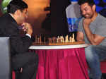 Aamir Khan plays Chess at an event Photogallery Times of India