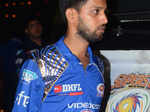A cricketer arrives at a party celebrating Mumbai Indians' IPL 8 win