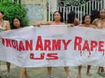 Naked women protested against the alleged rape and murder of Thangjam Manorama by paramilitary soldiers in Imphal Photogallery - Times of India