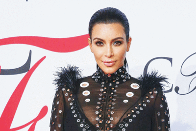 Kim’s dress catches fire, star tweets about baby rumours