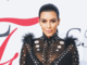 Kim&rsquo;s dress catches fire, star tweets about baby rumours