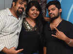 Nikil, Sruthi and Arun at a party