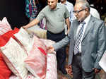 Guests admire pillow cover collection Photogallery - Times of India