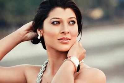 What is Tejaswini doing in Kolhapur?