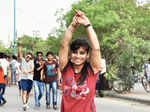 A participant poses during the Raahgiri Day