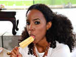 Kelly Rowland gets clicked while eating an ice cream