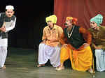 Artists perform during a play