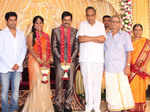 Gayathri Devi pose with guests during their wedding reception