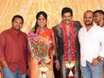 Vidharth and Gayathri Devi pose with guests during their wedding