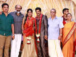 Gayathri Devi pose with guests during their wedding