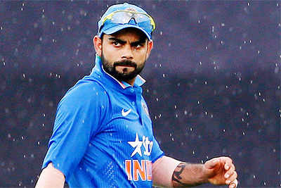 Virat Kohli keeps wickets to give MS Dhoni a one-over break