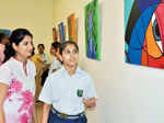 Sonali explaining her work to one of the guests