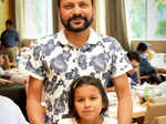 Sanjay poses with his daughter Mia