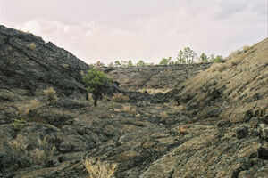 Walking across
volcanic badlands in the footsteps of ancient Americans