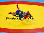 Azamat Sidakov of Russia (blue) and Stsiapan Papou of Belarus (red) compete