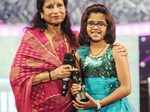 Uthara Unnikrishnan receives the Best Playback Singer - Female Award from Vani Jayram
